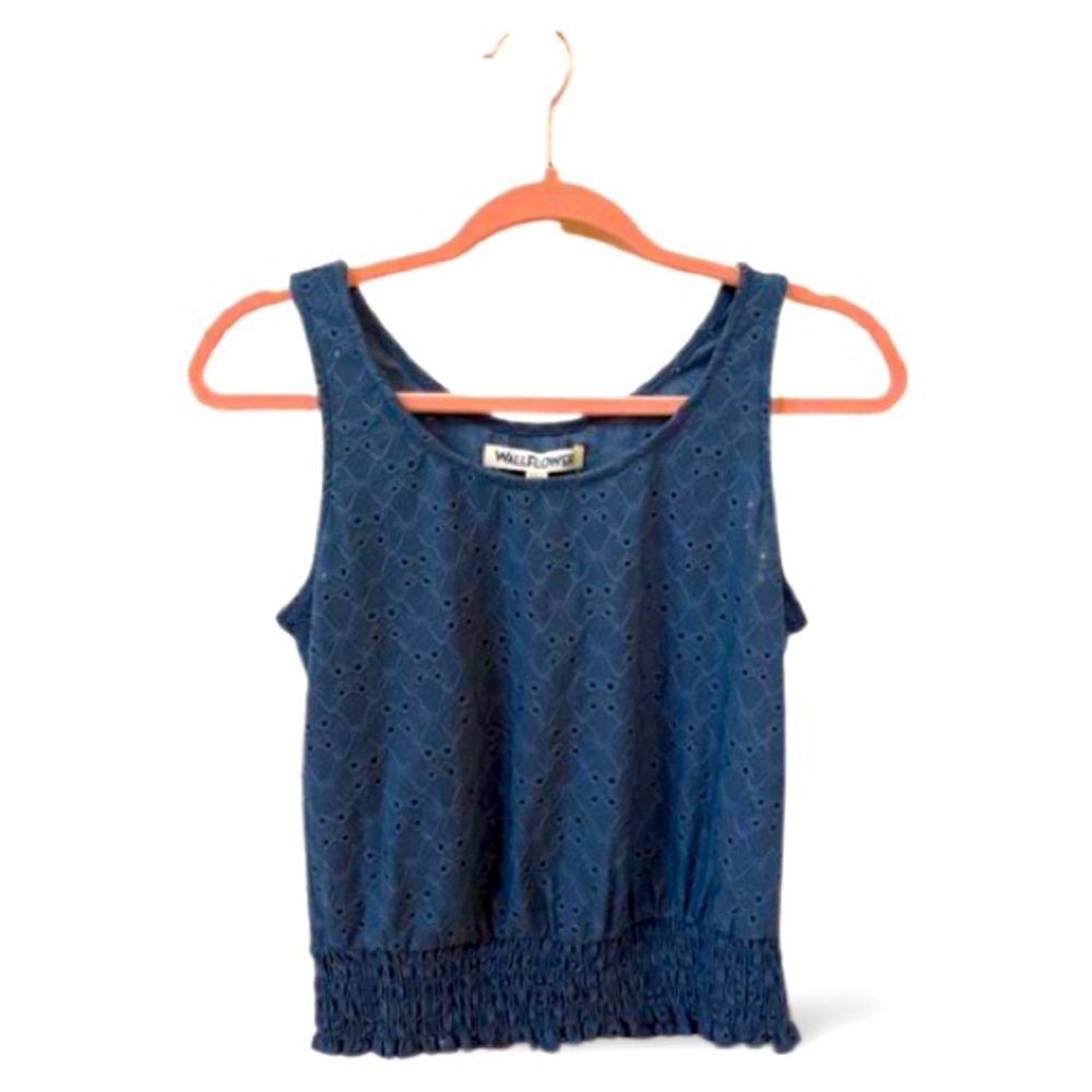Blue tank top with eyelets and ruching around the bottom.